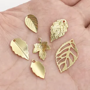 Detailed view of assorted 14K gold-plated leaf pendants for DIY jewelry making