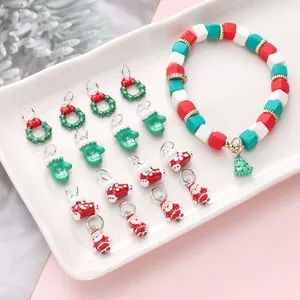 Christmas DIY jewelry set with enamel Santa, wreath charms and colorful beaded bracelet