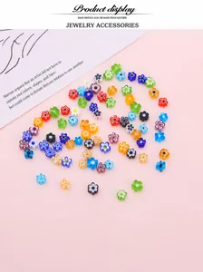 Macro shot of colorful millefiori glass beads in flower shape for DIY jewelry making