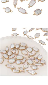 Detailed view of baroque freshwater pearls with gold plated edges for DIY jewelry making