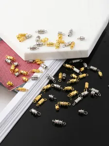 Detailed macro view of gold and silver screw clasps for DIY necklace and bracelet making