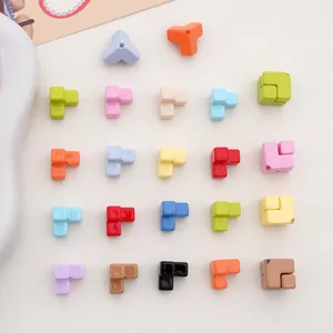 Close-up of colorful acrylic geometric block beads for DIY handmade phone chain accessories