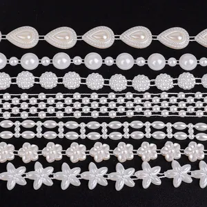 Various styles of ivory ABS pearl bead strands for wedding dresses and DIY hair accessories