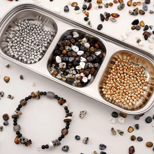 DIY jewelry kit with natural stone chips and metallic beads for handmade bracelets