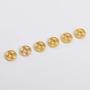Macro detail of six golden antique copper coins with matte finish and clear engravings
