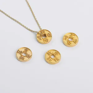Detailed close-up of golden Chinese five emperor coins with traditional lucky engravings