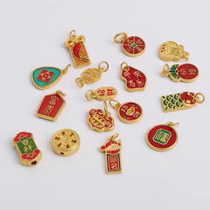 Macro detail of Chinese style enamel gold-plated DIY charms with auspicious characters