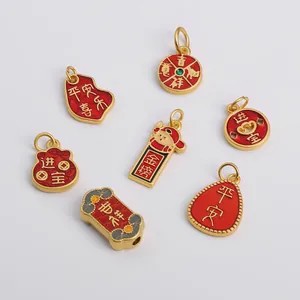 Detailed set of 7 gold-plated Chinese lucky charms with red and green enamel coating