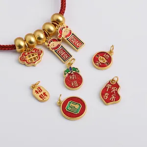 Detail showing red braided cord with gold fortune beads and colorful enamel lucky charms