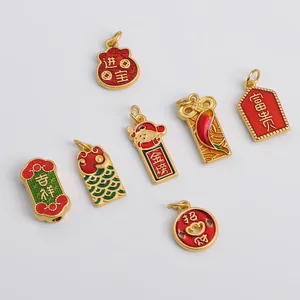Set of 7 gold-plated Chinese charms featuring red enamel and traditional fortune symbols