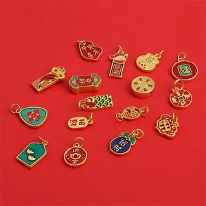 Golden enamel charms with traditional Chinese motifs like koi and lucky bags on red background