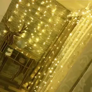 Warm white LED curtain string lights hanging for indoor home and room decoration