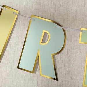 Mint green Happy Birthday banner with gold foil edging and white ribbon for party decor