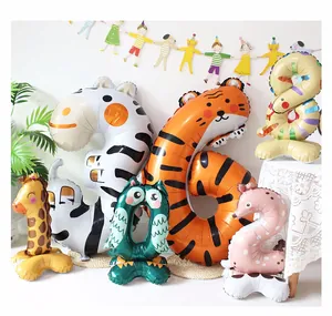 Detail of animal-themed aluminum foil number balloons with vibrant jungle patterns