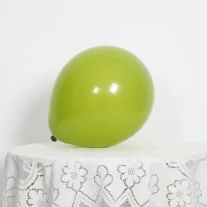 Detail of a 10-inch matte olive green latex balloon for elegant party backdrops