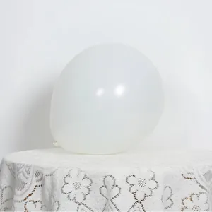 Detail of 10-inch matte latex white balloon with lace fabric for elegant party decor