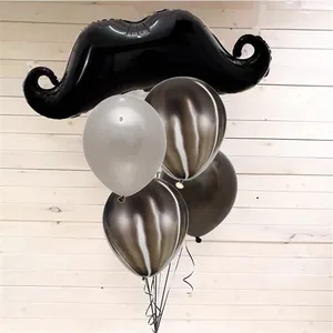 Decorative party set featuring large black mustache foil balloon with assorted latex balloons