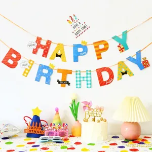 Colorful paper Happy Birthday banner kit with polka dot flags and party accessories
