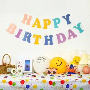 Rainbow Happy Birthday banner with party hats and daisy-shaped novelty glasses set