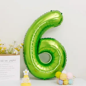 Detailed view of a large number 6 fruit green foil balloon for birthday party decorations
