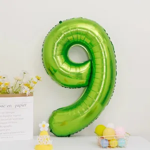 Detail of 40-inch fruit green number 9 foil balloon for party decoration