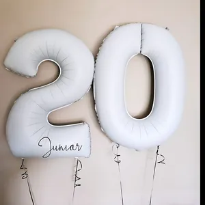 Matte white 32-inch number 20 balloon with Junior script for birthday party decor