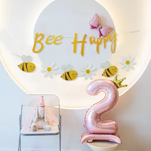 Bee Happy floral birthday banner and pink number 2 balloon for toddler party decor