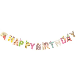 Banderole HAPPY BIRTHDAY colorée avec icônes de dessins animés pour décoration