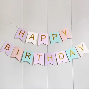 Gold-stamped Happy Birthday banner with fishtail bunting in pastel macaron colors