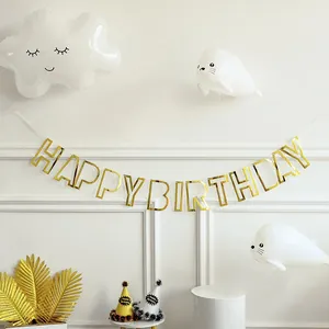 Golden hollow HAPPY BIRTHDAY banner set with white clouds and party hats decoration
