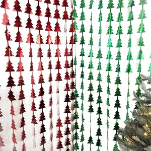 Red and green Christmas tree tinsel foil curtains for festive wall decorations and party backdrops
