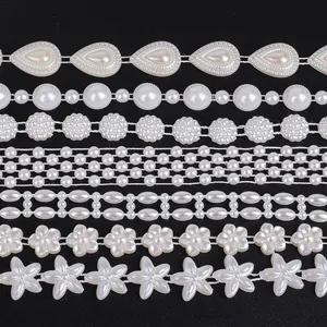 Detail of assorted white ABS pearl bead trim styles for DIY jewelry making and crafts