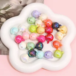 Close-up of colorful iridescent acrylic rabbit beads for DIY jewelry making and crafts