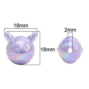 Macro detail of 18mm purple iridescent dragon horn beads with 2mm hole for DIY crafts