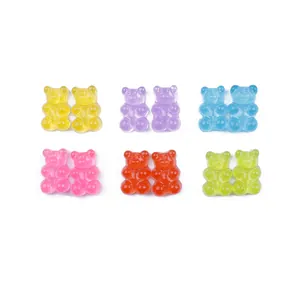 Macro view of colorful resin gummy bear charms in yellow, purple, blue, pink, and red