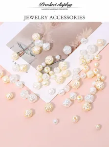 Detailed view of cream white acrylic pearl rose beads for DIY jewelry making
