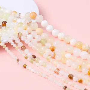 Mixed cream and beige synthetic jade beads in various sizes for DIY jewelry making