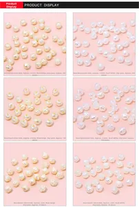 Detail of rose shaped acrylic pearl beads in white and beige for DIY jewelry making