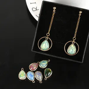 Boucles d'oreilles et pendentifs en résine goutte d'eau avec bordure en cuivre