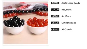 Detailed view of red and black agate loose beads in a ceramic bowl for DIY jewelry