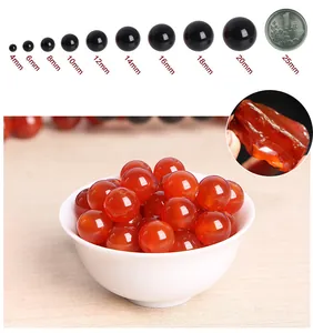 Detailed size comparison of polished red agate beads ranging from 4mm to 20mm diameter