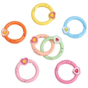 Close-up of heart-shaped colorful spring rings in assorted candy colors for DIY bags