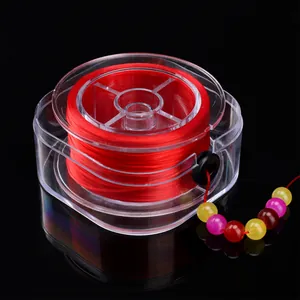 Macro detail of red 0.8mm elastic crystal string spool for DIY jewelry and beaded bracelets