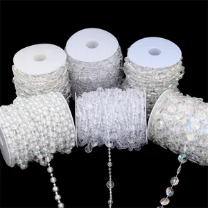 Macro shot of assorted crystal bead chains on spools for wedding and DIY decoration