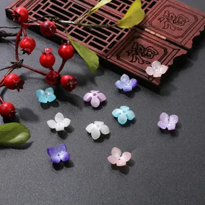 Close-up of 14mm acetate flower petals for DIY hairpins in various pastel colors
