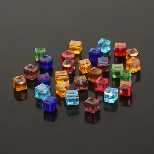Macro shot of 8mm colorful transparent cube crystal beads with center holes for DIY crafts