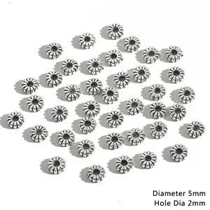 Detail von 5mm Antiksilber-Blumenperlen mit 2mm Loch für DIY-Schmuckherstellung