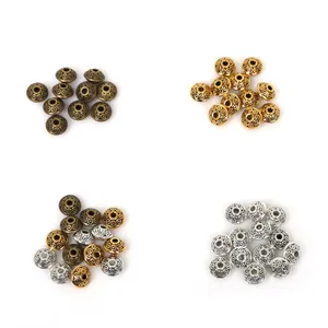 Platte ronde metalen tussenkralen in schijfvorm voor DIY-sieraden met vintage reliëf