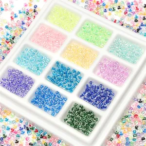 Detailed view of 12-grid organizer box filled with colorful glass seed beads for DIY jewelry