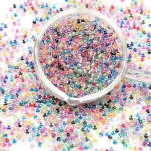 Close-up of colorful mixed 2/3/4mm glass seed beads for DIY jewelry making and crafts